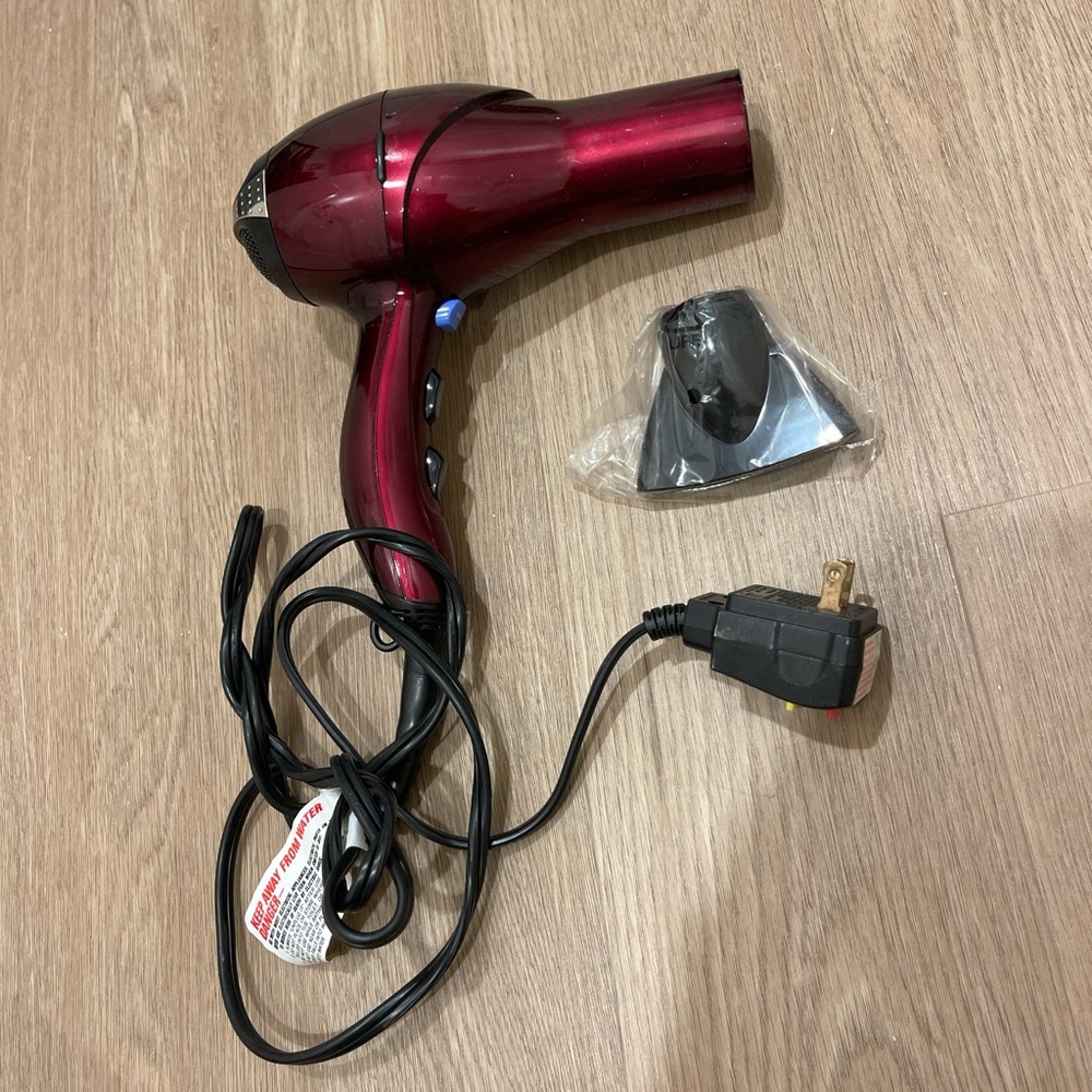Red Hair Dryer with Nozzle Attachment